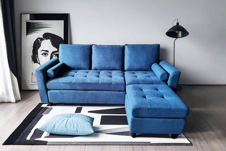 Canapé 3 places en velours bleu avec pouf photo d'ambiance