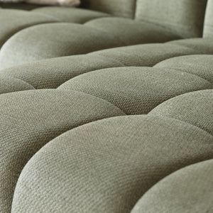 Canapé d'angle 3 places nuage en velours vert Salford zoom sur le tissu velours