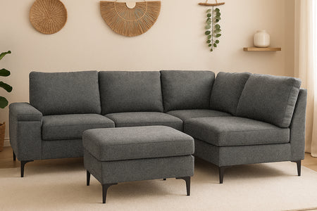 Canapé d'angle 4/5 places en tissu chenille gris anthracite avec pouf et espace de rangement Colchester photo d'ambiance