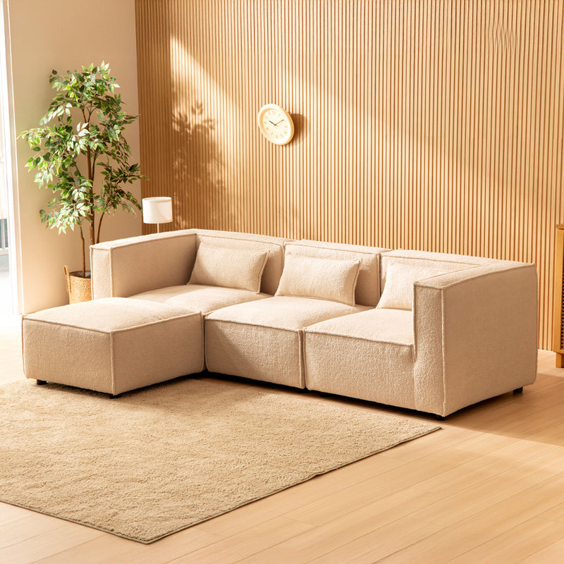 Canapé modulable 3 places bouclette beige avec pouf Modular vue de 3/4