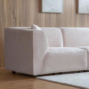 Canapé velours côtelé 4 places modulable beige Monroe larges accoudoirs
