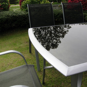 Salon de jardin en aluminium gris 6 places Alassio zoom table en verre trempé
