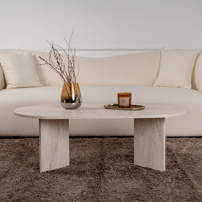 Table basse ovale effet travertin 119x60cm Lyu de face