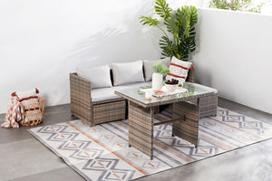 salon de jardin repas en résine 5 places avec poufs