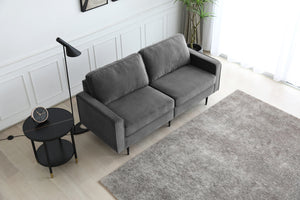 Canapé design en velours gris foncé vue d'en haut