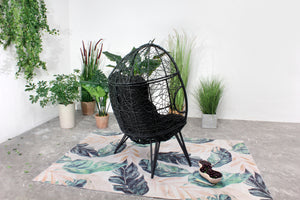 fauteuil oeuf sur pieds aspect rotin noir 